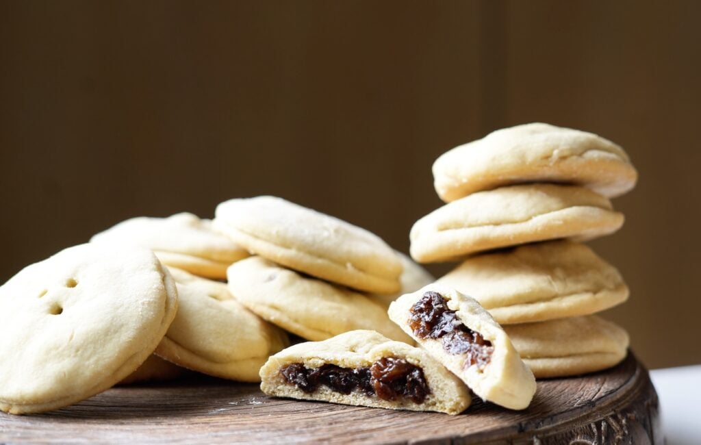 old fashioned raisin filled cookie stacked on board