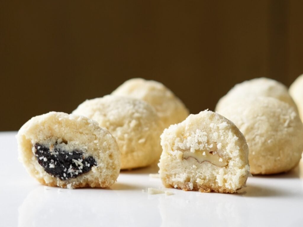 row of coconut surprise cookies with nuts and fruit