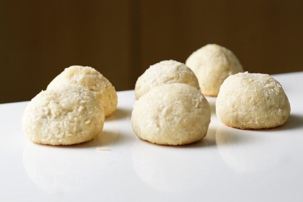 row of uncut coconut surprise cookies
