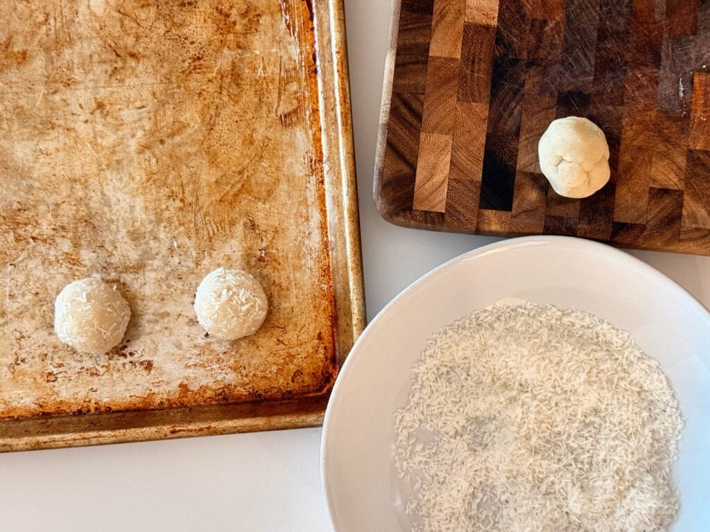 shaping and baking the coconut surprise cookies