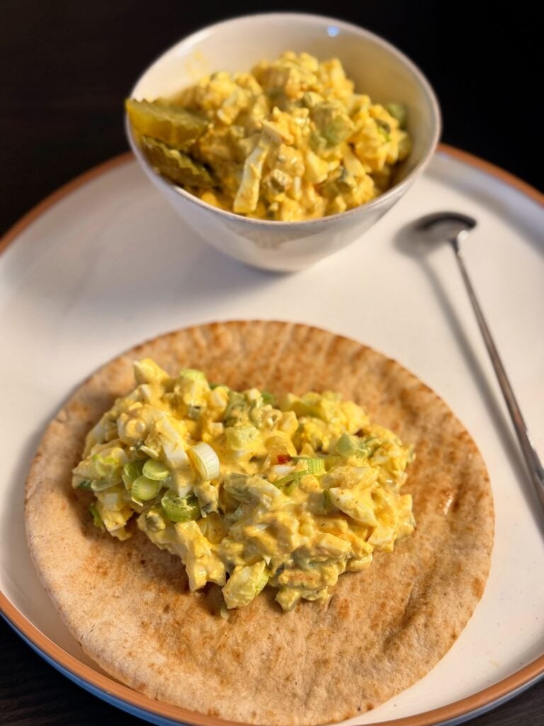 spicy pickle egg salad on table close up on table