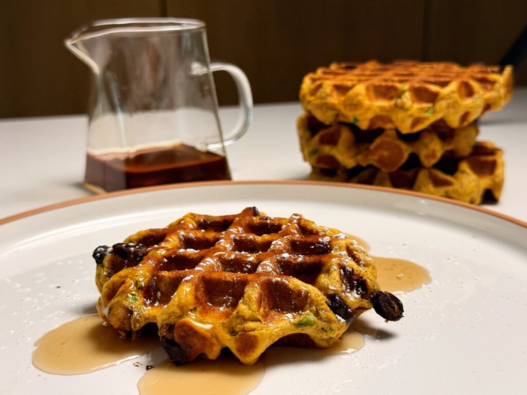 wide shot of finished zucchini bread waffles
