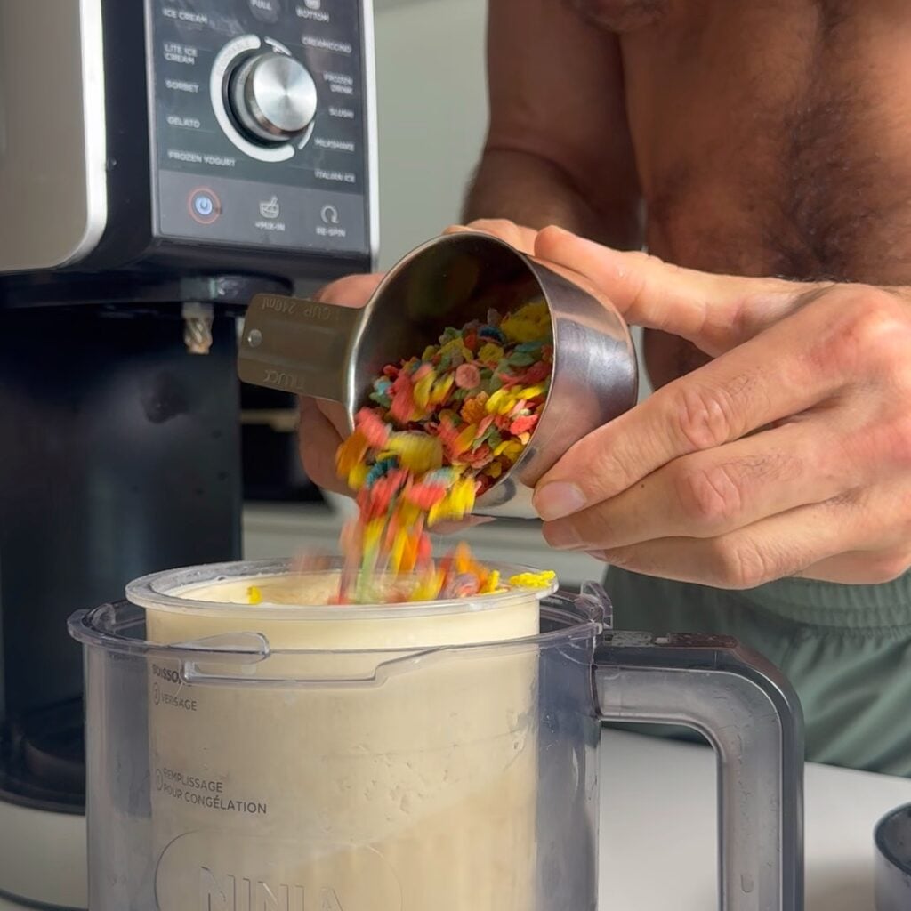 adding cereal to ice cream