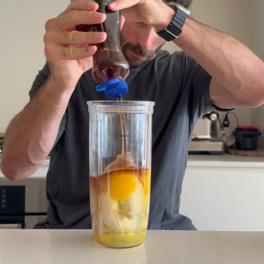 adding wet ingredients to blend