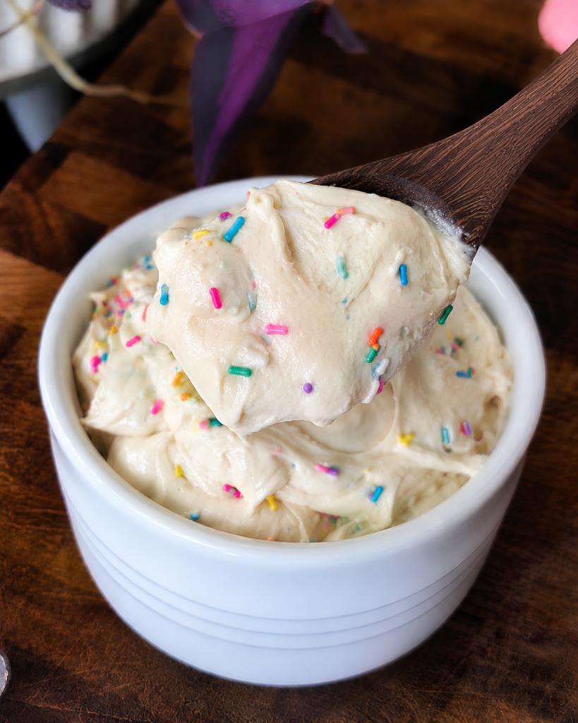 birthday cake protein batter in spoon