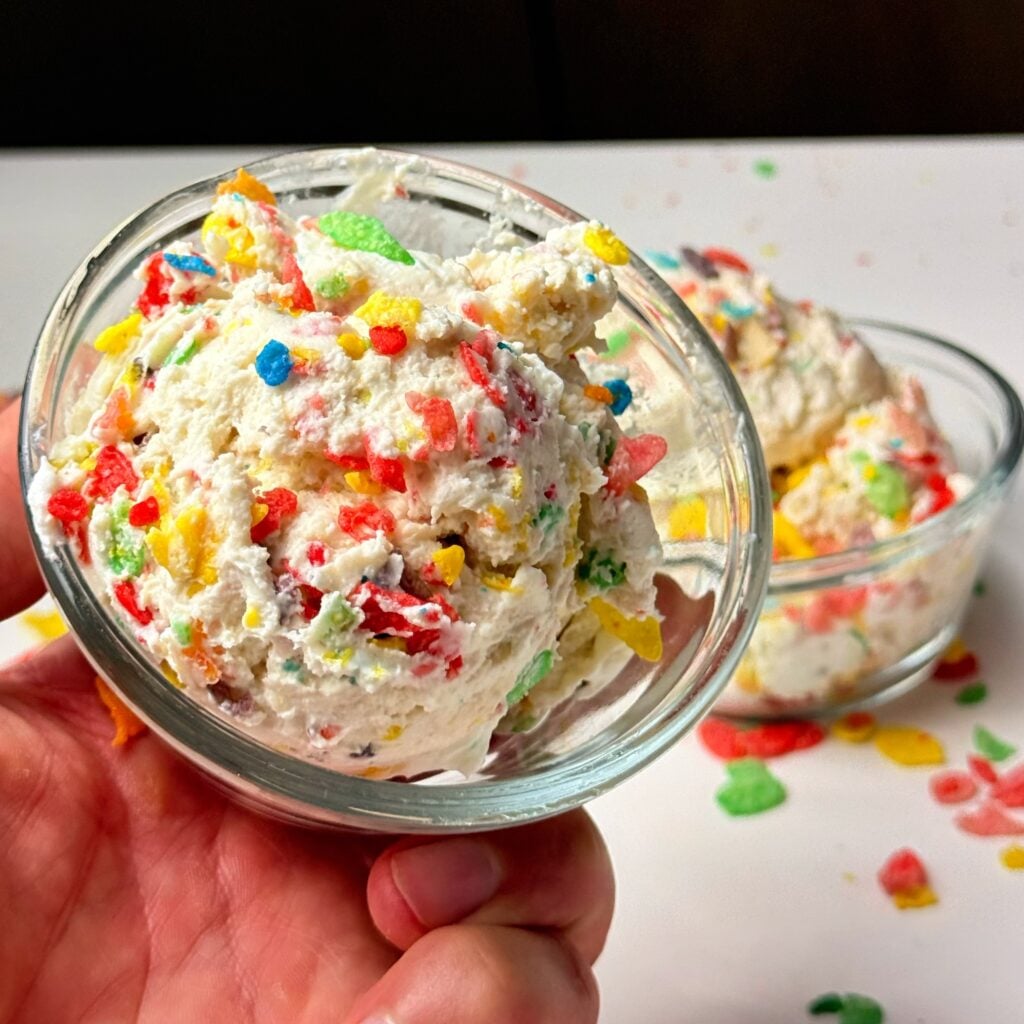 Fruity Pebbles Fluffy yogurt in hand