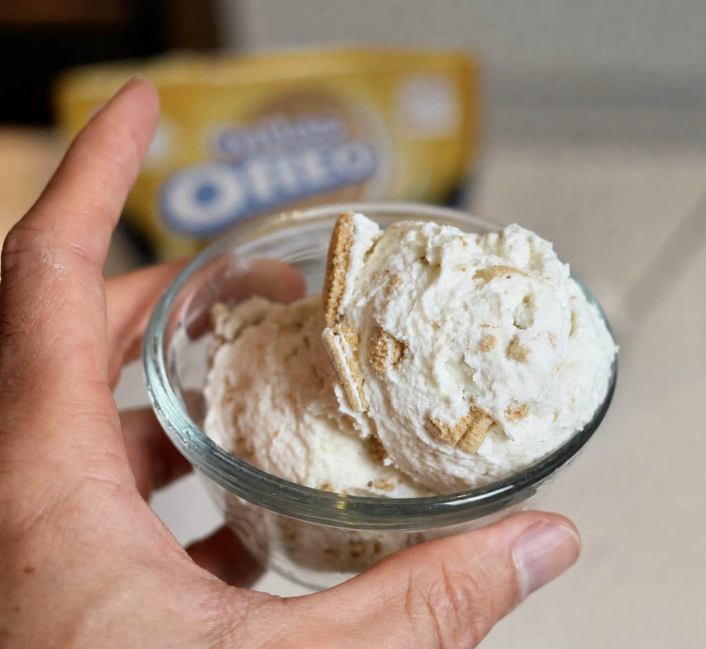 golden oreo fluffy yogurt in hand