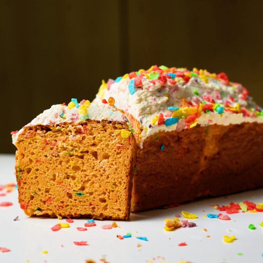 hero image for fruity pebble loaf cake