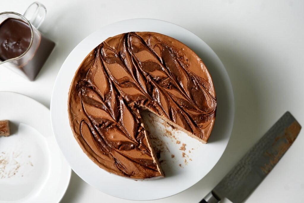 high protein double chocolate cheesecake wide shot on counter