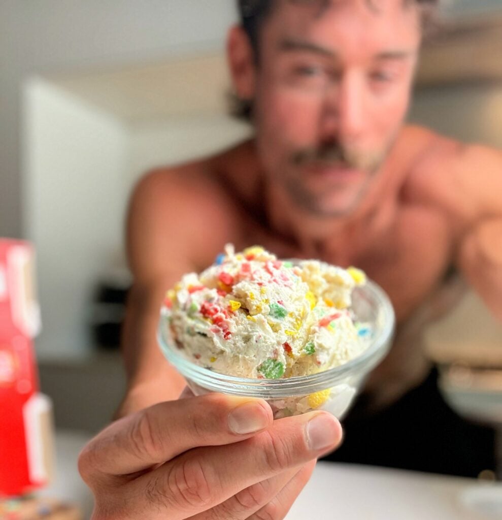jacob holding Fruity Pebbles Fluffy yogurt in hand