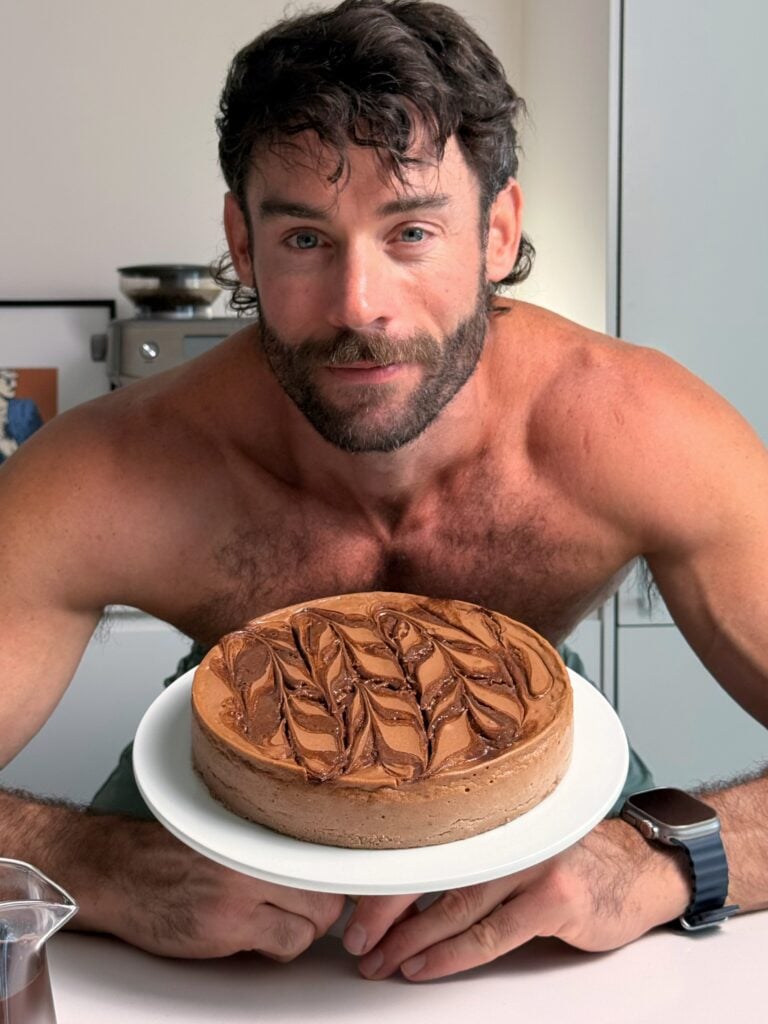 jacob holding his brand new cheesecake