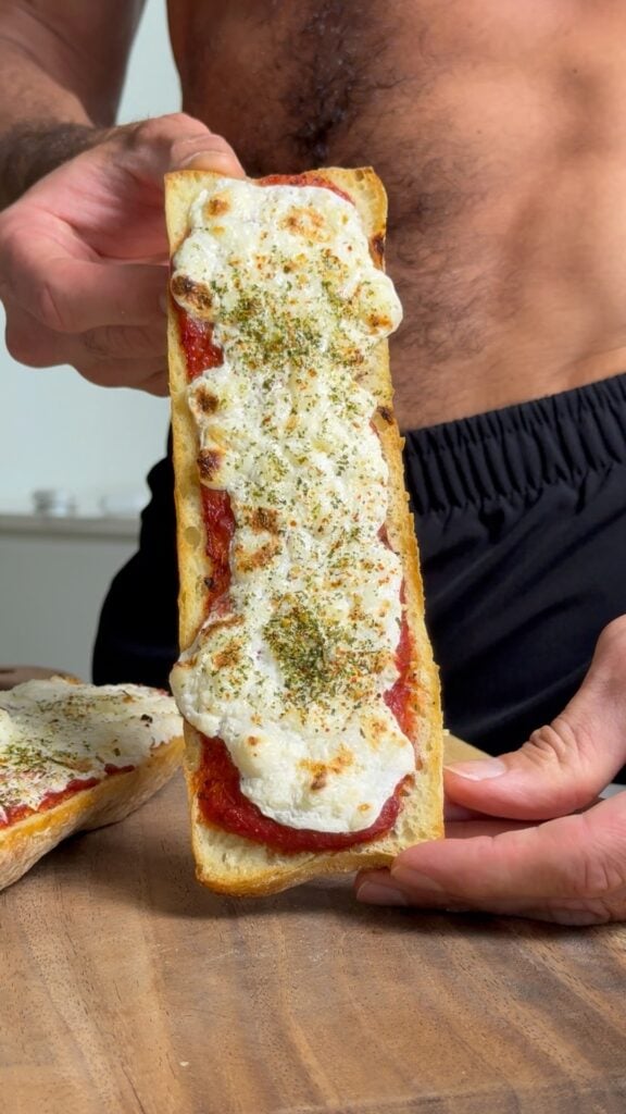 jacob showing some high protein cottage cheese pizza toast