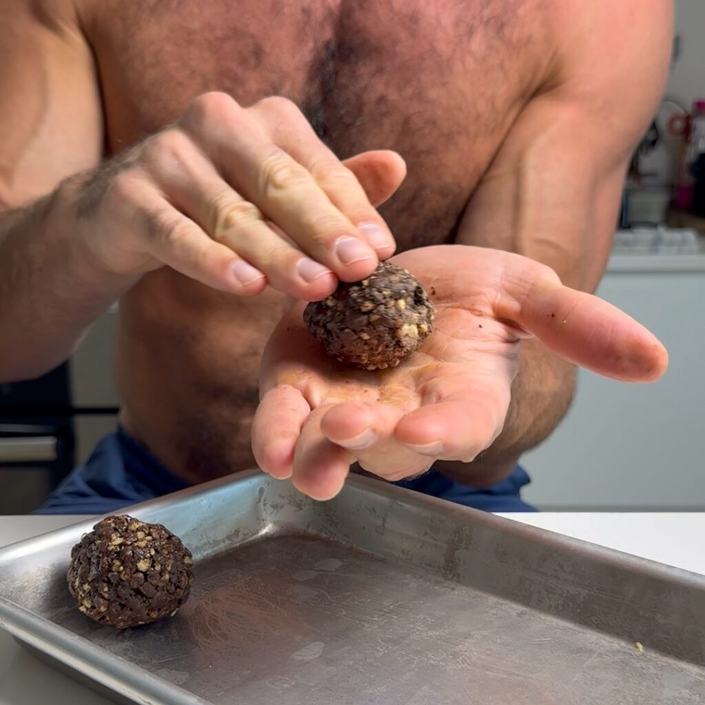 rolling the chocolate crunch protein truffle