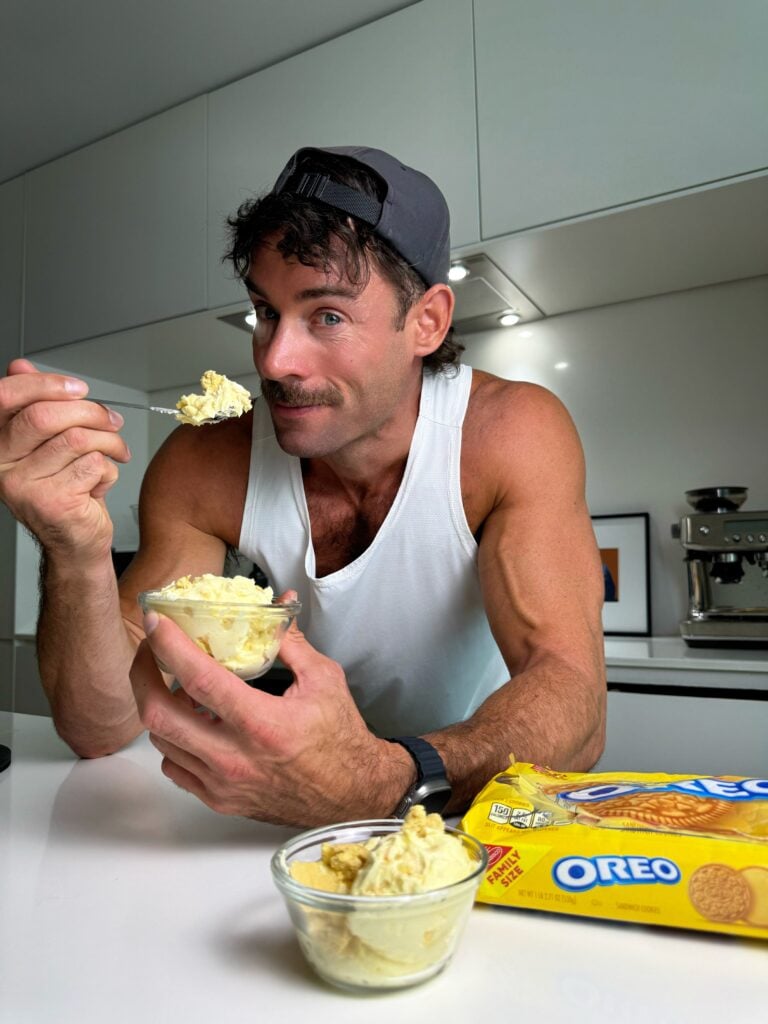 jacob enjoying lemon oreo fluffy yogurt scoop in bowl