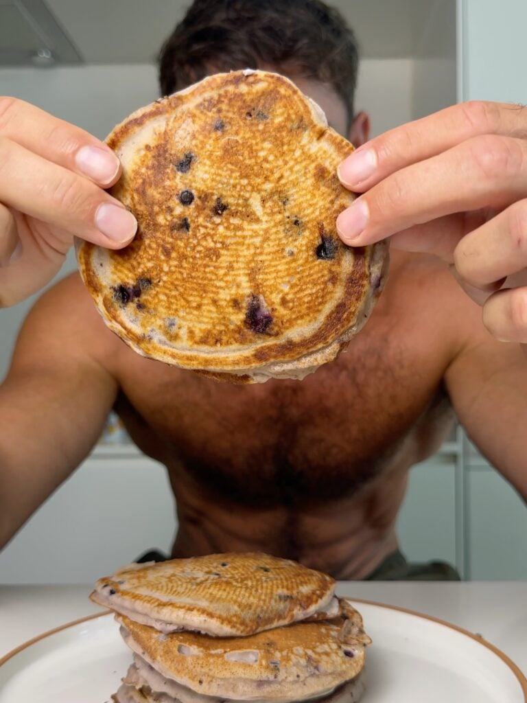jacob holding the blueberry pancakes