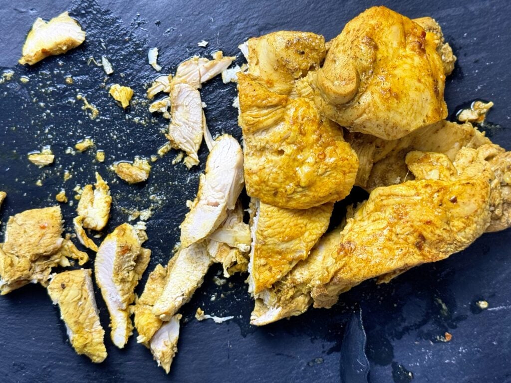 slicing chicken shawarma meal prep