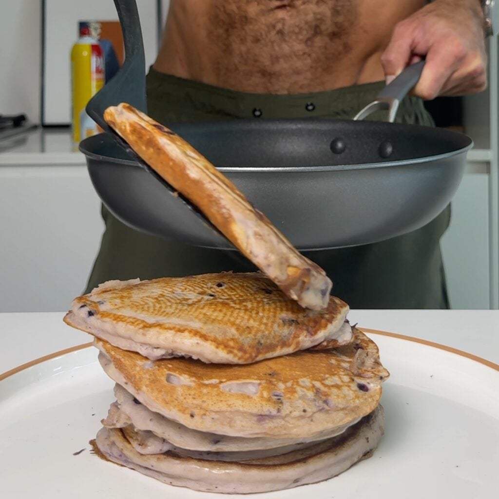 stacking the blueberry pancakes
