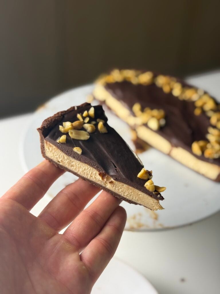 tart on plate and on hand