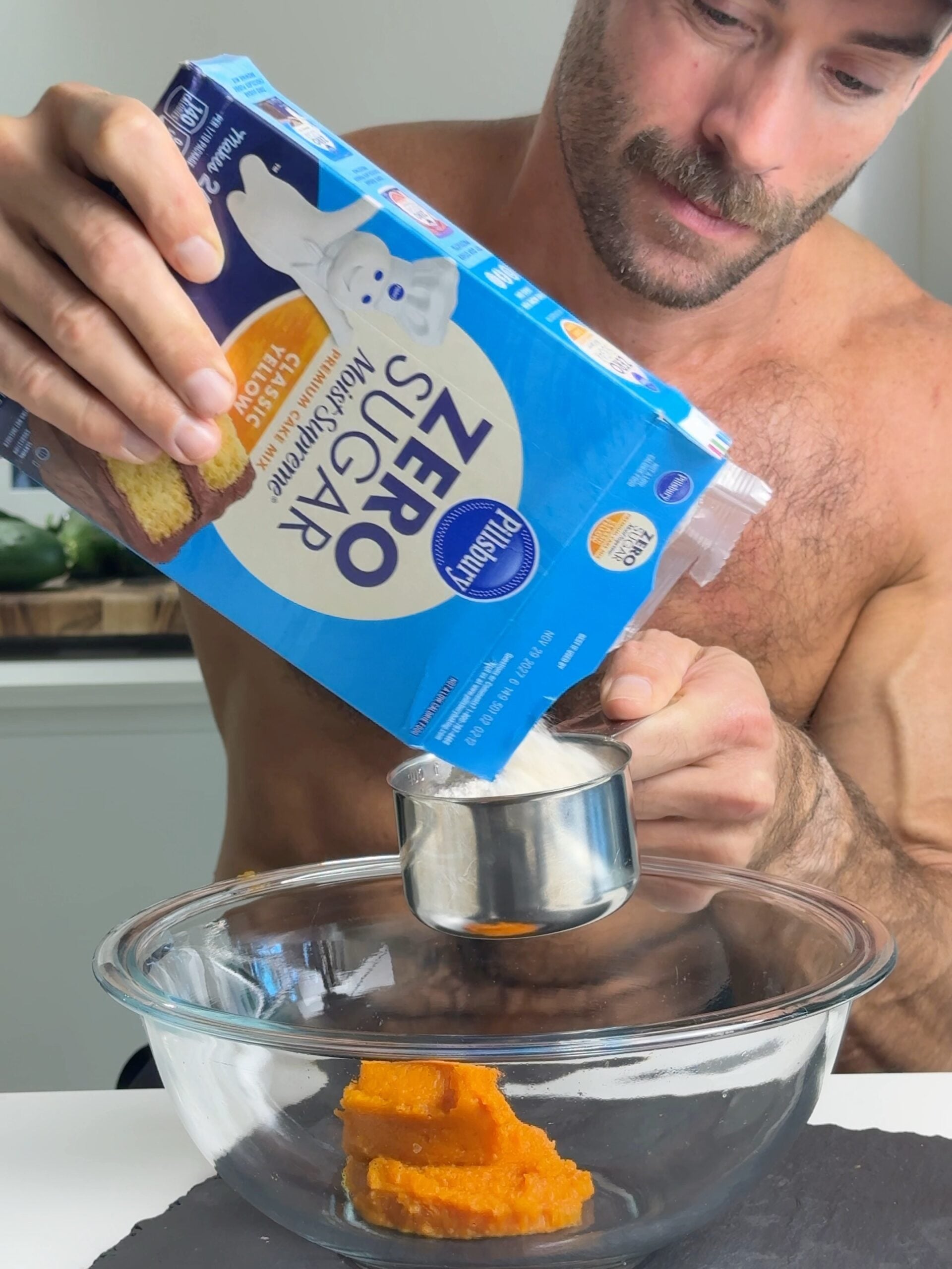 Jacob holding a box of Pillsbury Zero Sugar Classic Yellow Cake Mix