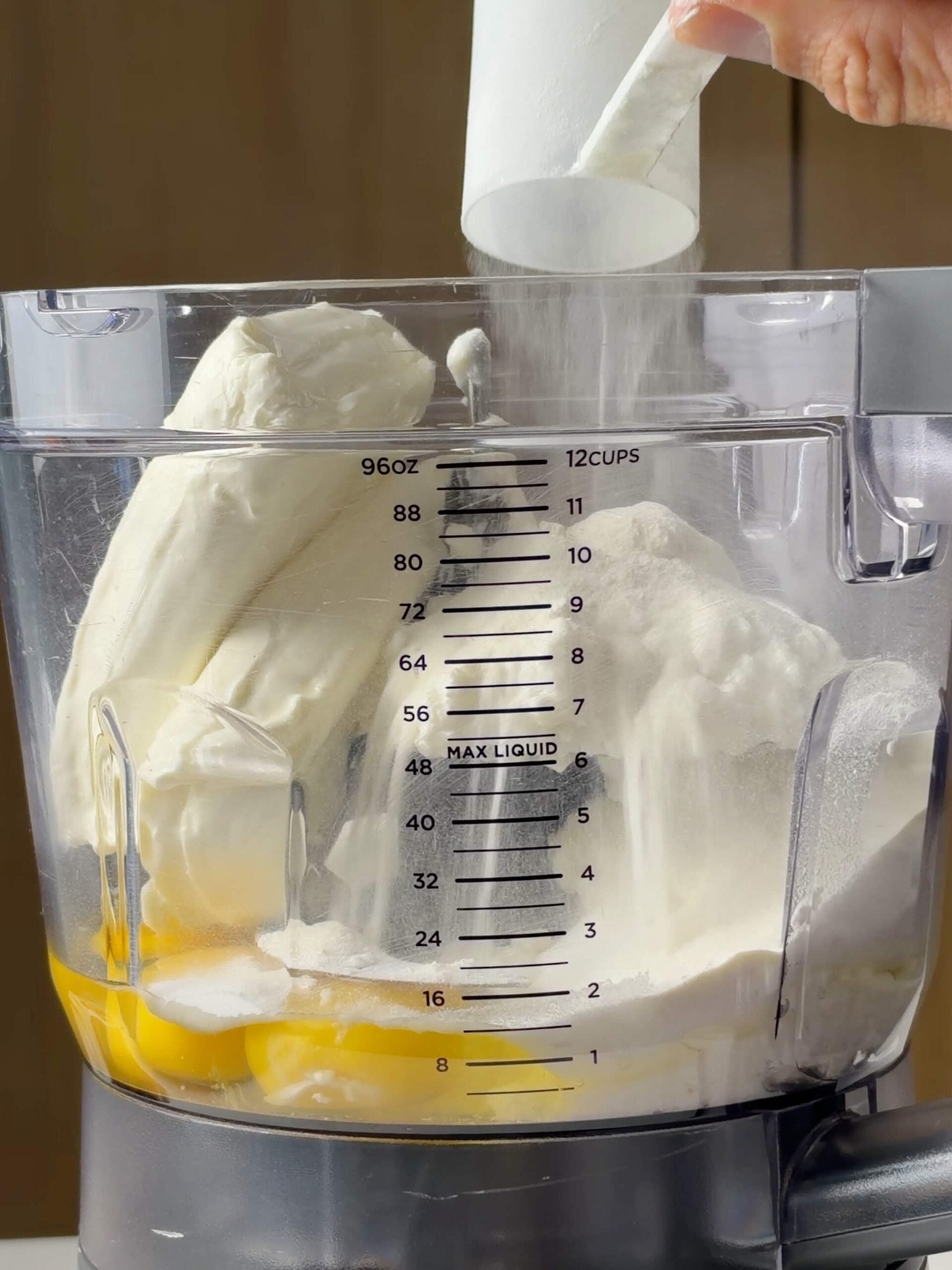 Cream cheese, cottage cheese, eggs, protein powder, and sweetener in a food processor
