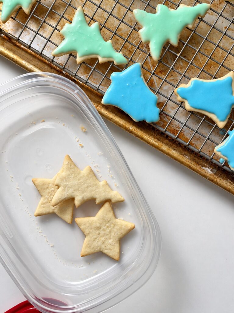 Plain and iced cream cheese sugar cookies after baking