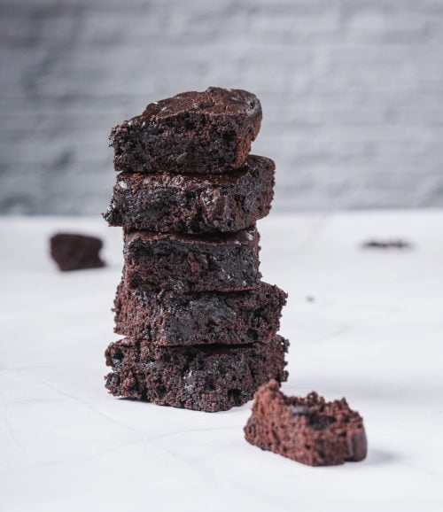 Tall stack of gluten free high protein brownies