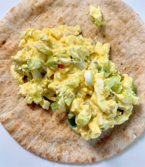 spicy pickle egg salad on table close up